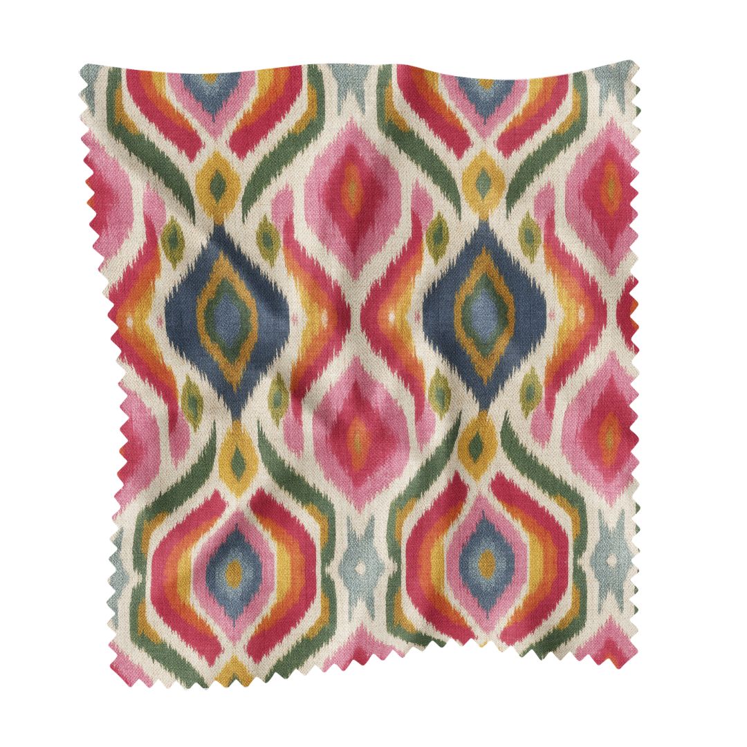 Bloomsbury Ikat Fabric by the Yard by Laura Park featuring hand-painted ikat in reds, oranges, yellows, and pinks — designer upholstery — designer upholstery and drapery fabric by the yard.