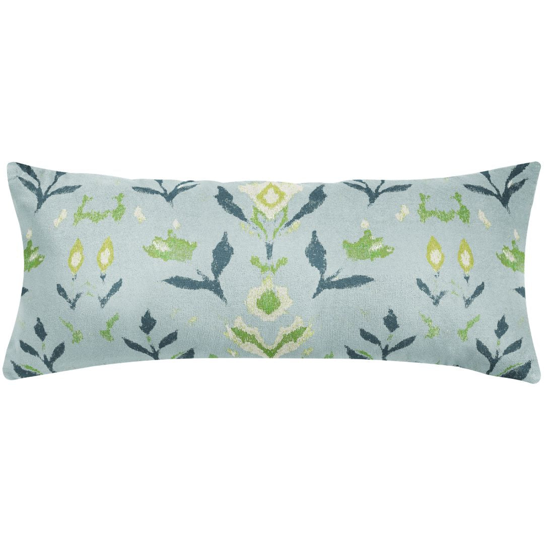 Laura Park's Petal Garden Navy hand painted design on a decorative throw pillow with a navy, olive green, and off white hand painted floral pattern on a light blue background ready to be styled on a couch, bed, or accent chair. 