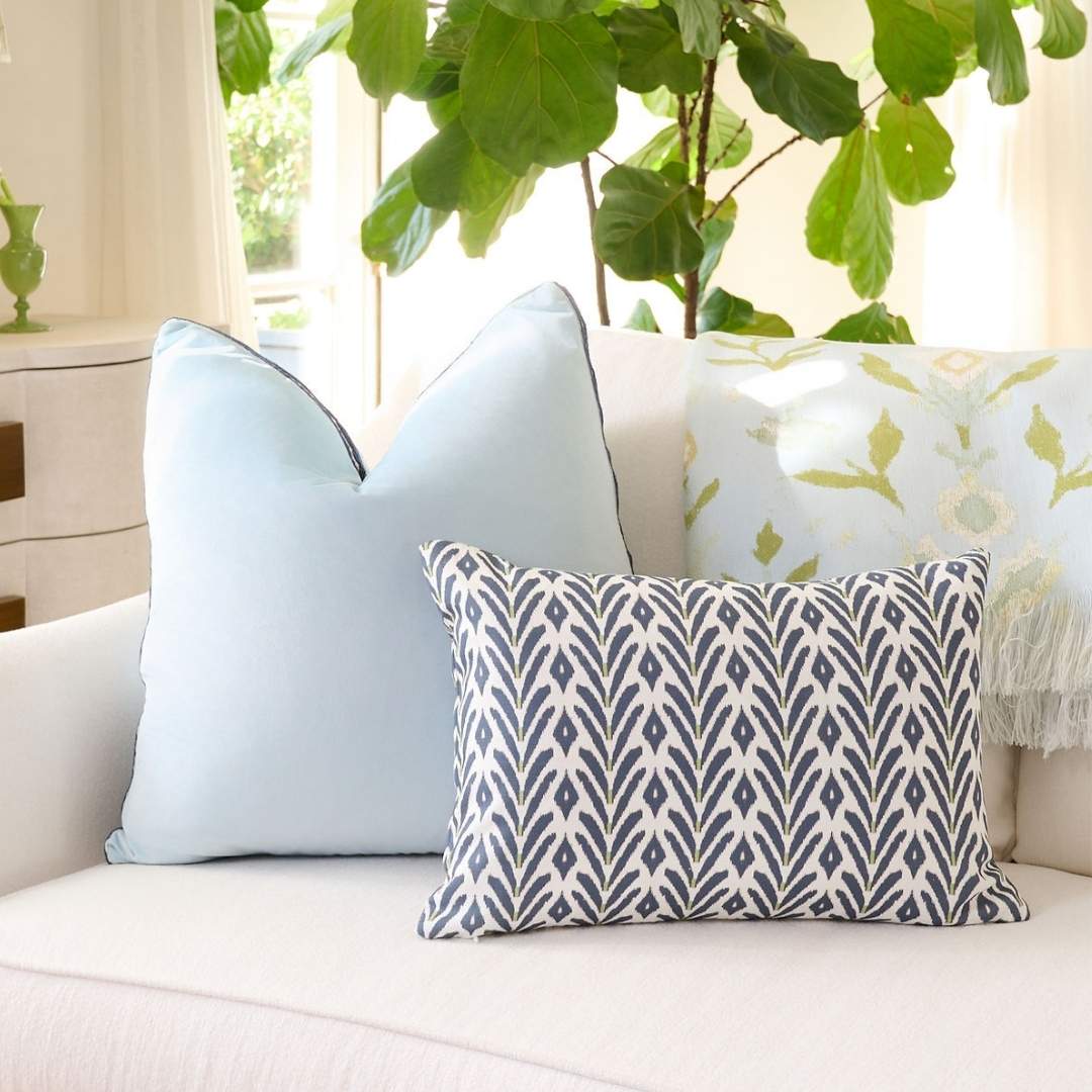 Light Blue Velvet Pillow with Navy Embroidery by Laura Park — signature print home and lifestyle product.