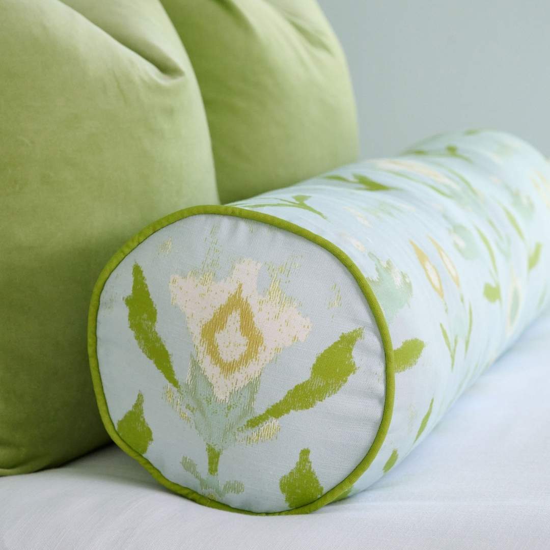 Petal Garden Aqua with Green Piping Round Bolster Pillow by Laura Park — signature print home and lifestyle product.