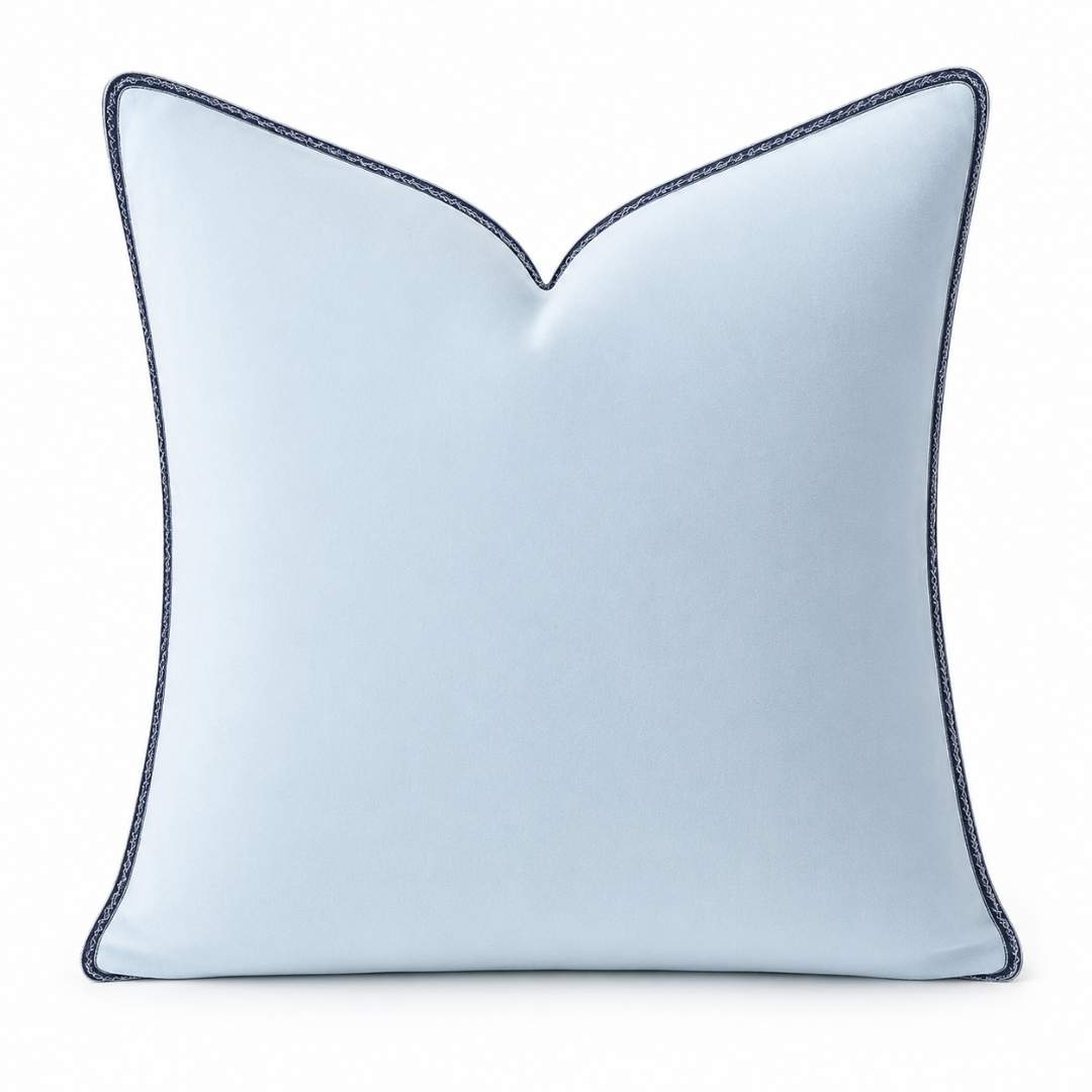 Light Blue Velvet Pillow with Navy Embroidery by Laura Park — signature print home and lifestyle product.