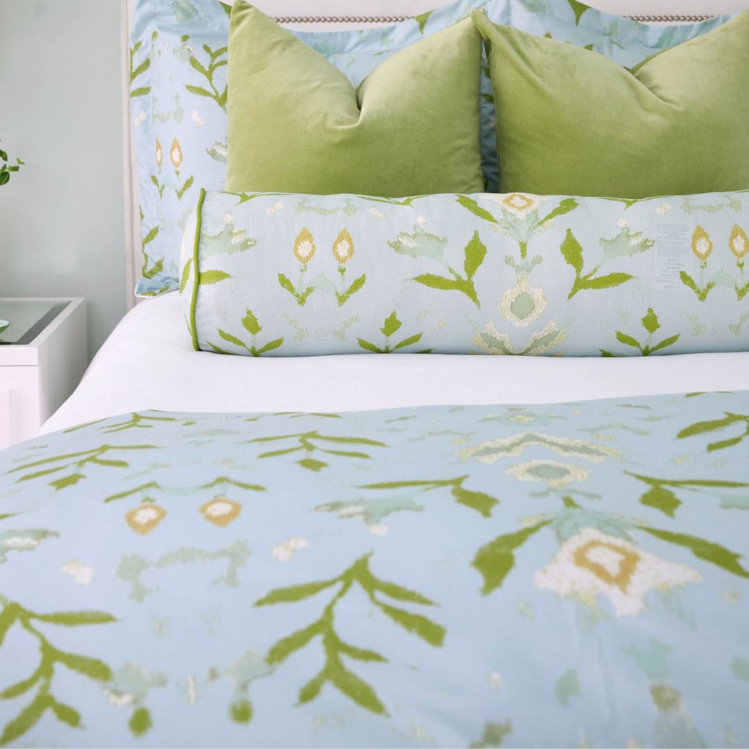 Laura Park Petal Garden Aqua bedding in floral motifs on a solid aqua background — duvet cover for master bedroom and guest room.